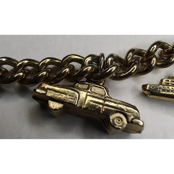 Vintage Gold Tone Charm Bracelet Airplane Cruise Ship Train Engine Florida Cross - Picture 4 of 13
